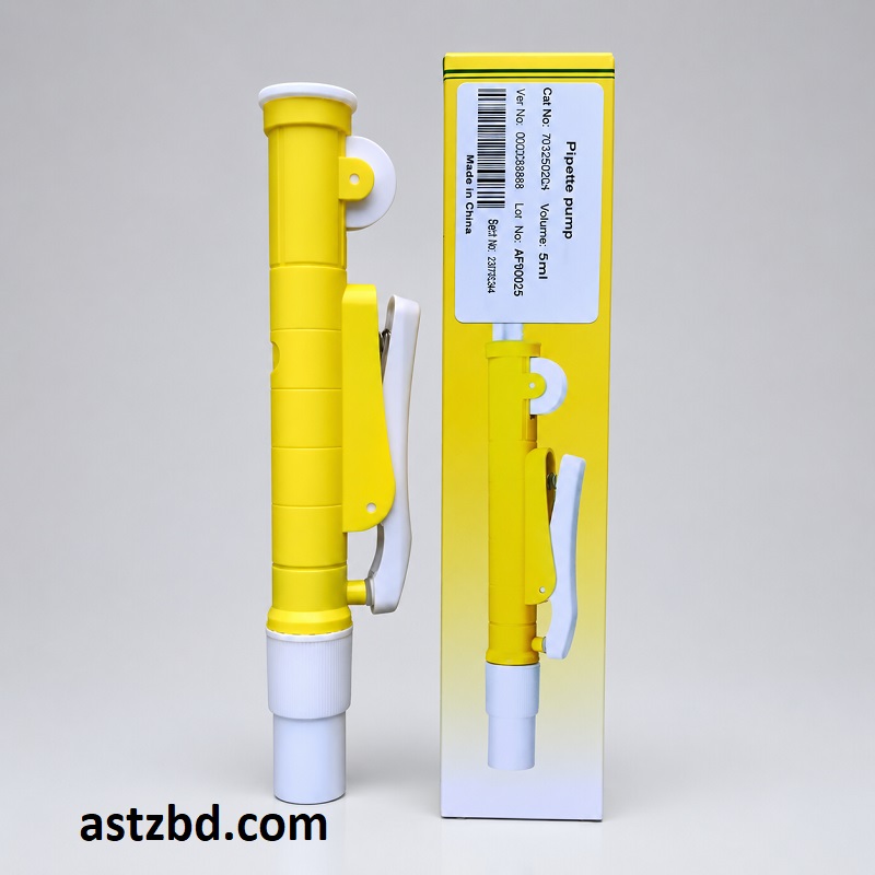 Pipette Pump Yellow 5ml attached to a glass pipette transferring blue reagent in a chemistry lab